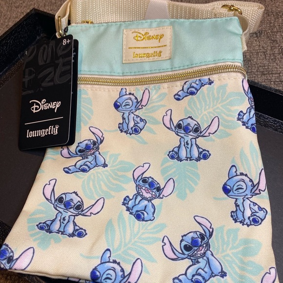 Disney Handbags - Disney Loungefly Crossbody bag, Stitch design, NWT, so cute! 😍